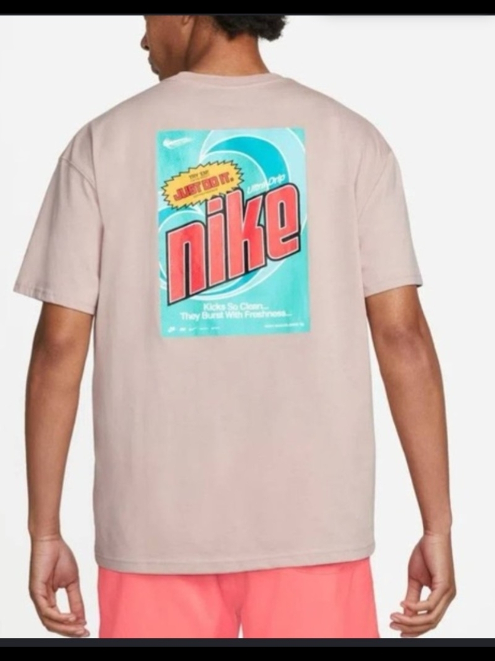 Nike Graphic Back-Print Tee in Light Beige with Turquoise Logo